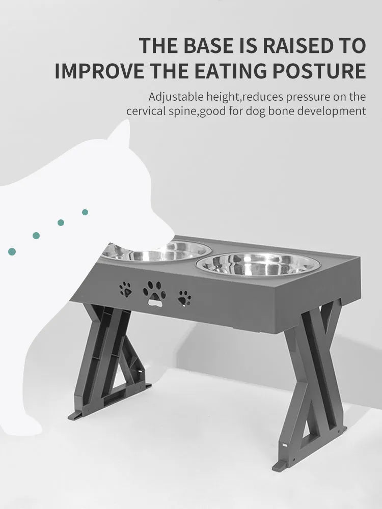 Black folding pet bowl with stainless steel interior and plastic outer shell on surface