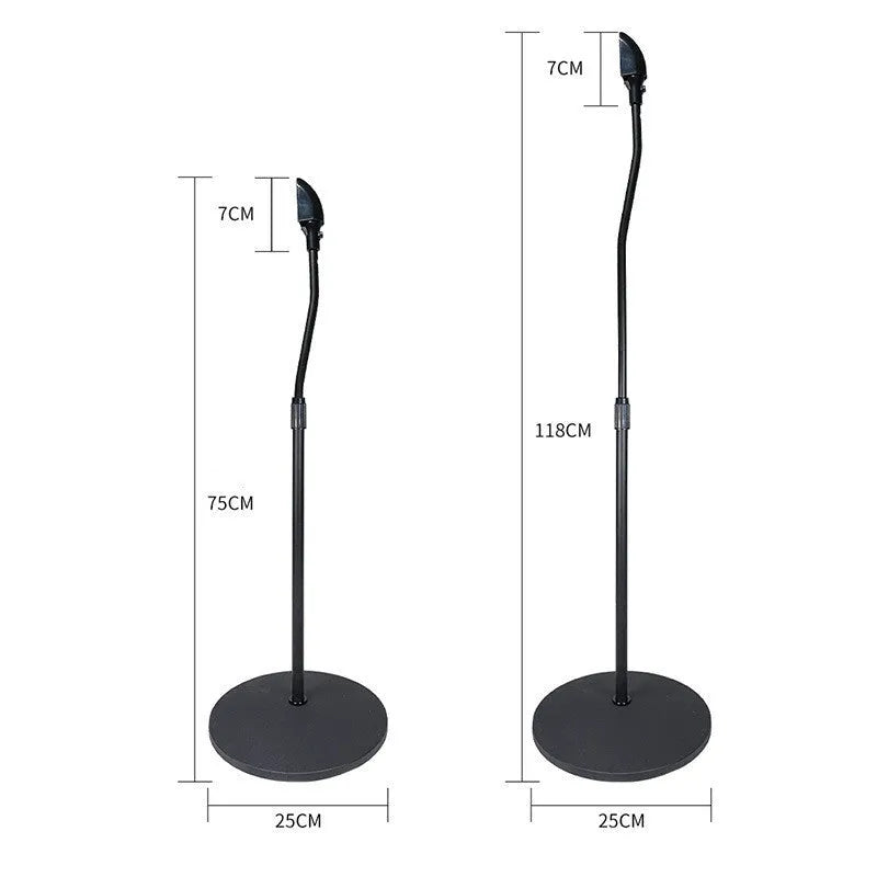 Black tripod speaker stand with universal hanger mount for bookshelf speakers on a wooden floor.