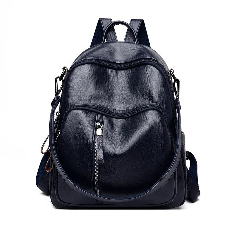Ladies PU backpack in colour block design with zip pockets and document bag, vertical square shape, black blue or red.