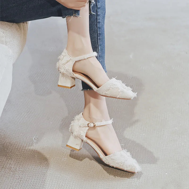 Women's apricot suede D'Orsay flats with an ankle strap and a 3cm low heel on a plain background.