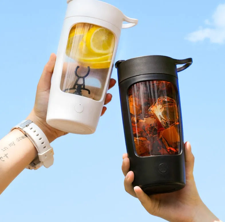 Portable automatic blender cup in black, blue, pink or white, showing 650ml capacity and compact size