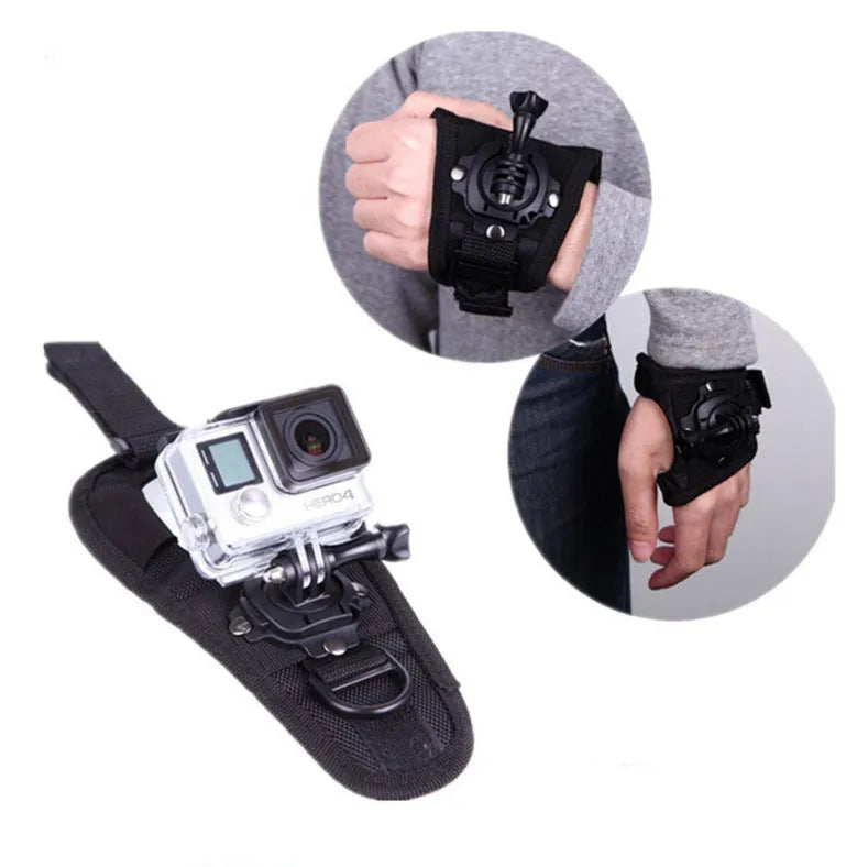 Black GoPro wrist strap with 360-degree rotating camera mount on a palm