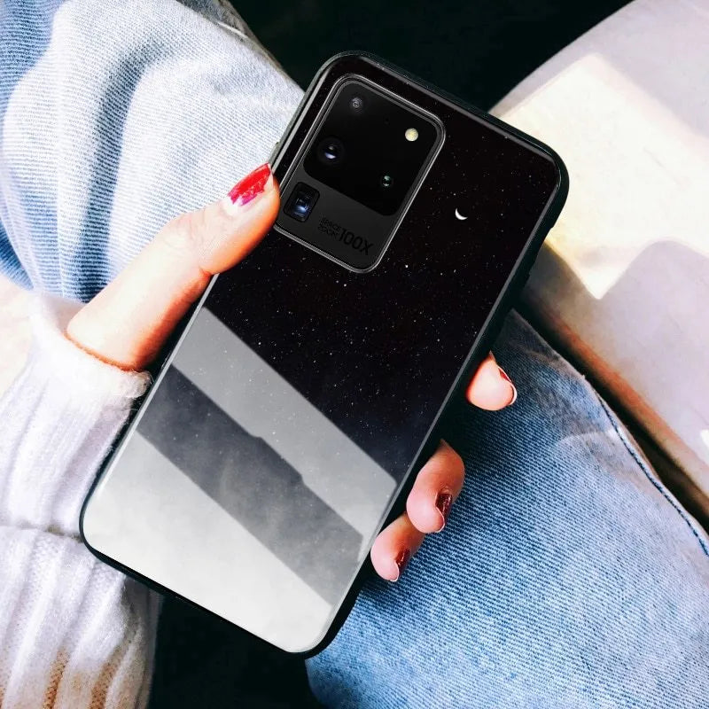 Black silicone phone case for Samsung Galaxy and Apple iPhone models on white background