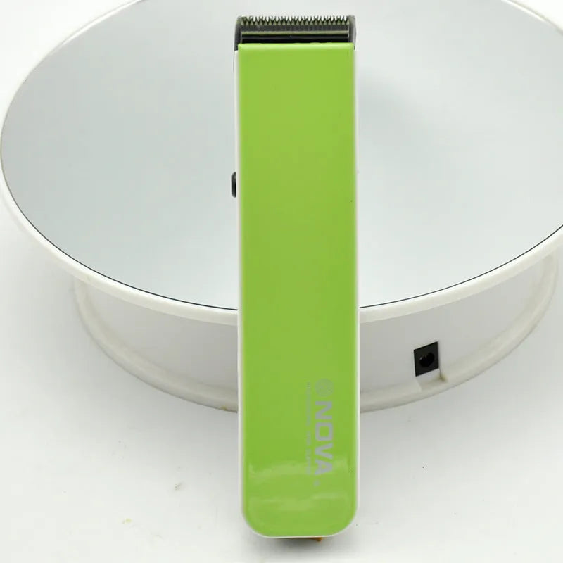 Electric hair clipper in multiple colours with removable blade head.