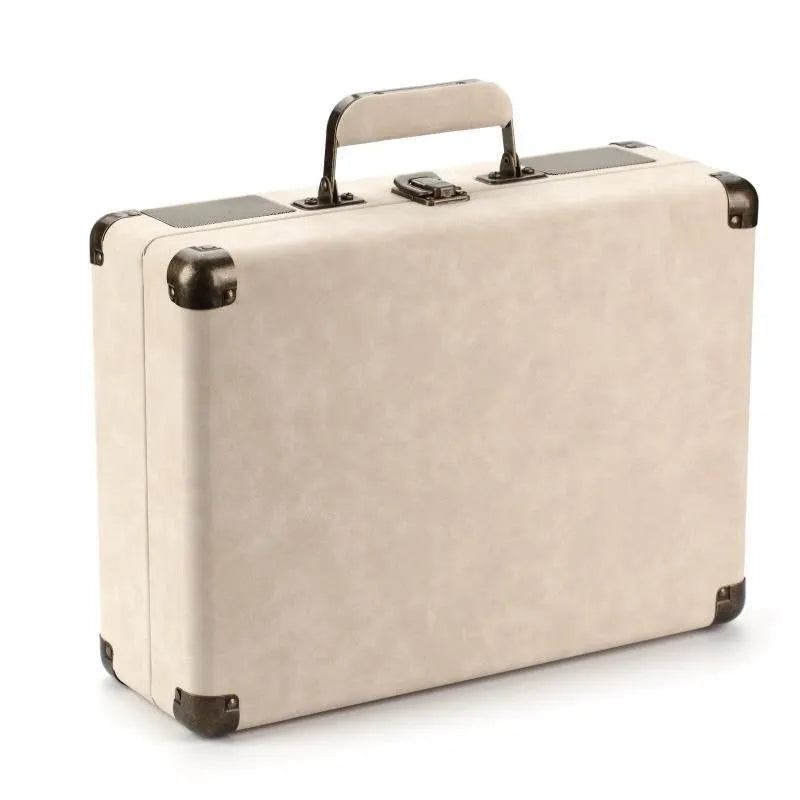 Portable Bluetooth record player in a leather-textured suitcase case, shown in a selection of colours.