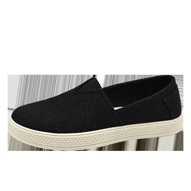 Men's beige canvas casual shoes with round toe and shallow cut, shown on a white background.