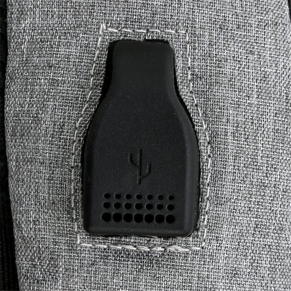 USB charge anti theft backpack in black polyester with zipper closure, 43x26x13cm, fits MacBook Air and iPad