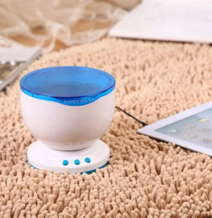 Blue ocean-themed LED projection lamp for children's rooms and play areas.
