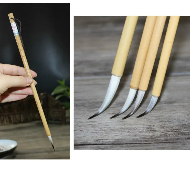 Set of four Chinese calligraphy brushes with gold pine branch design and mixed wolf hair and wool bristles