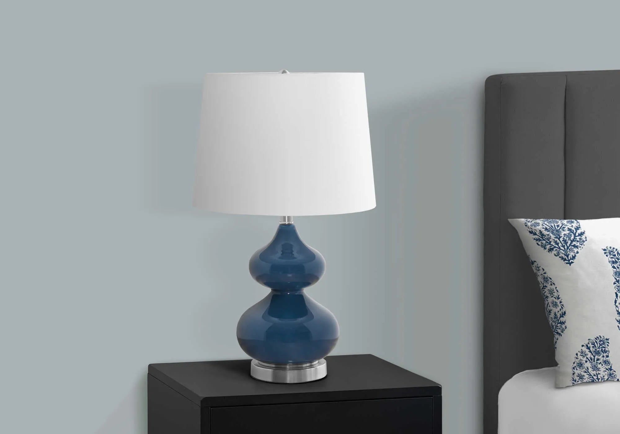 Blue crystal glass children's desk lamp with cloth shade on bedside table