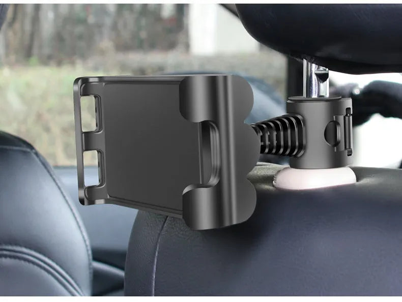 Black car headrest bracket holding tablet with 360-degree rotation mechanism