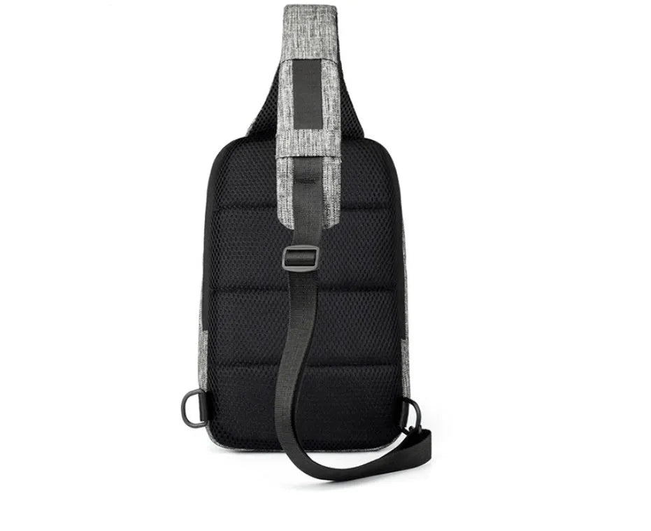 Dark blue Oxford cloth chest bag with adjustable strap, worn across the chest, showing front zipper and square shape.