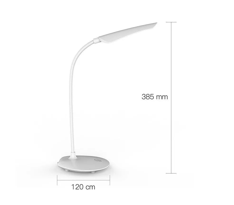 White LED desk lamp with touch control and USB charging on a wooden desk, showing compact 385x120x100mm size