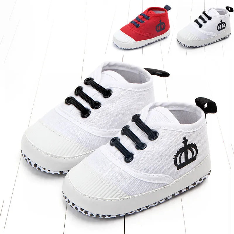 Red and white cotton canvas toddler shoes with elastic band closure in three size options