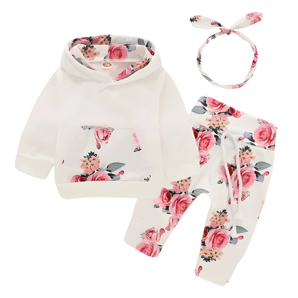 White cotton hooded tracksuit set for a baby girl, showing long sleeves and full-length trousers.