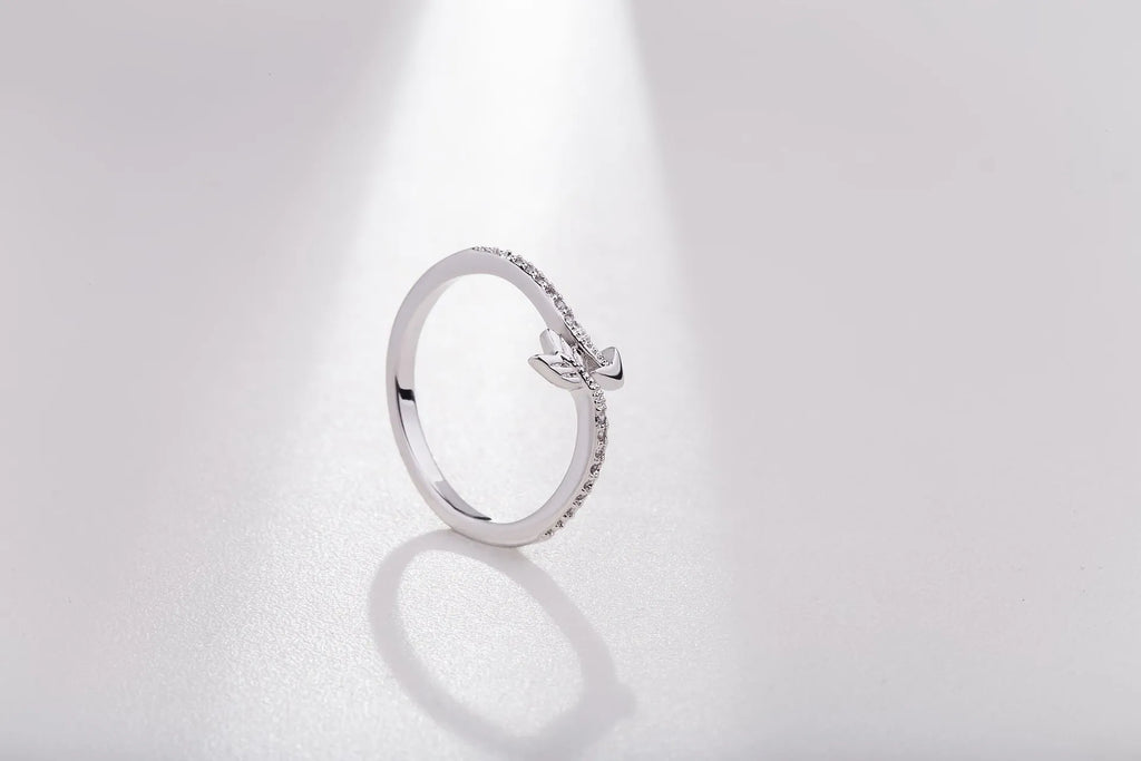 Women's arrow feather ring with white copper plating and cubic zirconia, available in US sizes 5-8