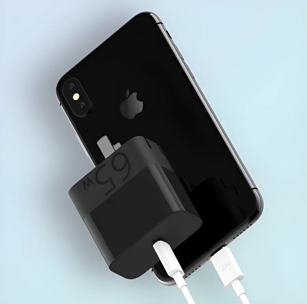 Black ZMI USB-C 65W notebook power adapter showing compact size
