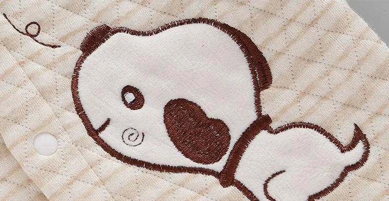 Infant warmer suit in cotton with cartoon stripe pattern and buckle closure in buckle camel colour