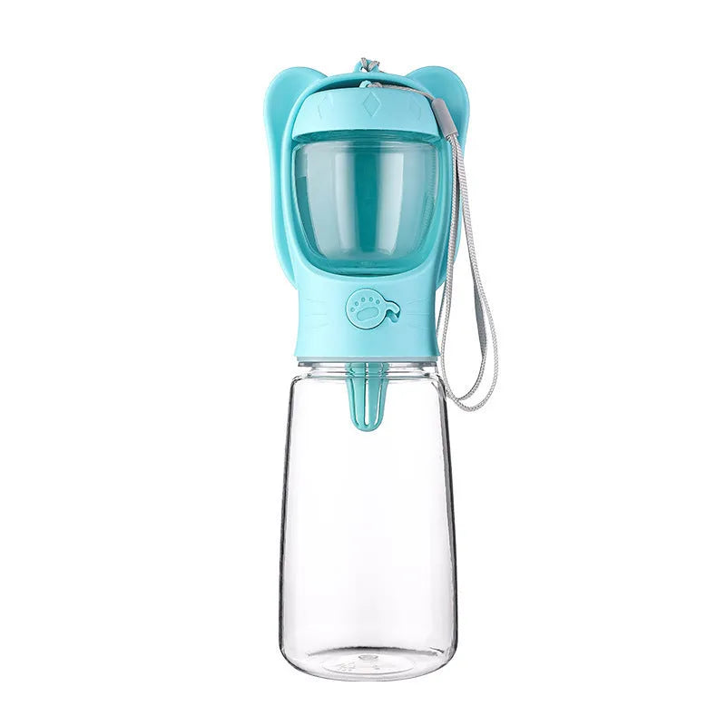 2-in-1 portable dog water bottle with food container, leak-proof, 350ml, green, on hiking trail