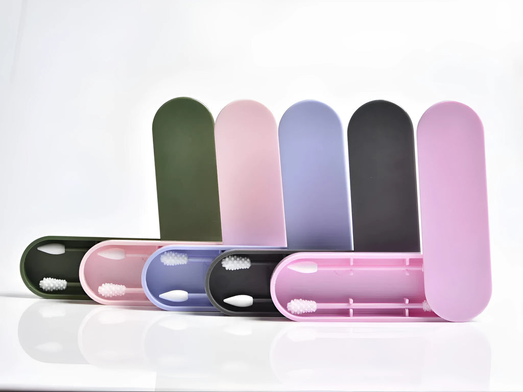 Double-headed silicone ear stick in pink, reusable cleaning tool for dirt and grease removal