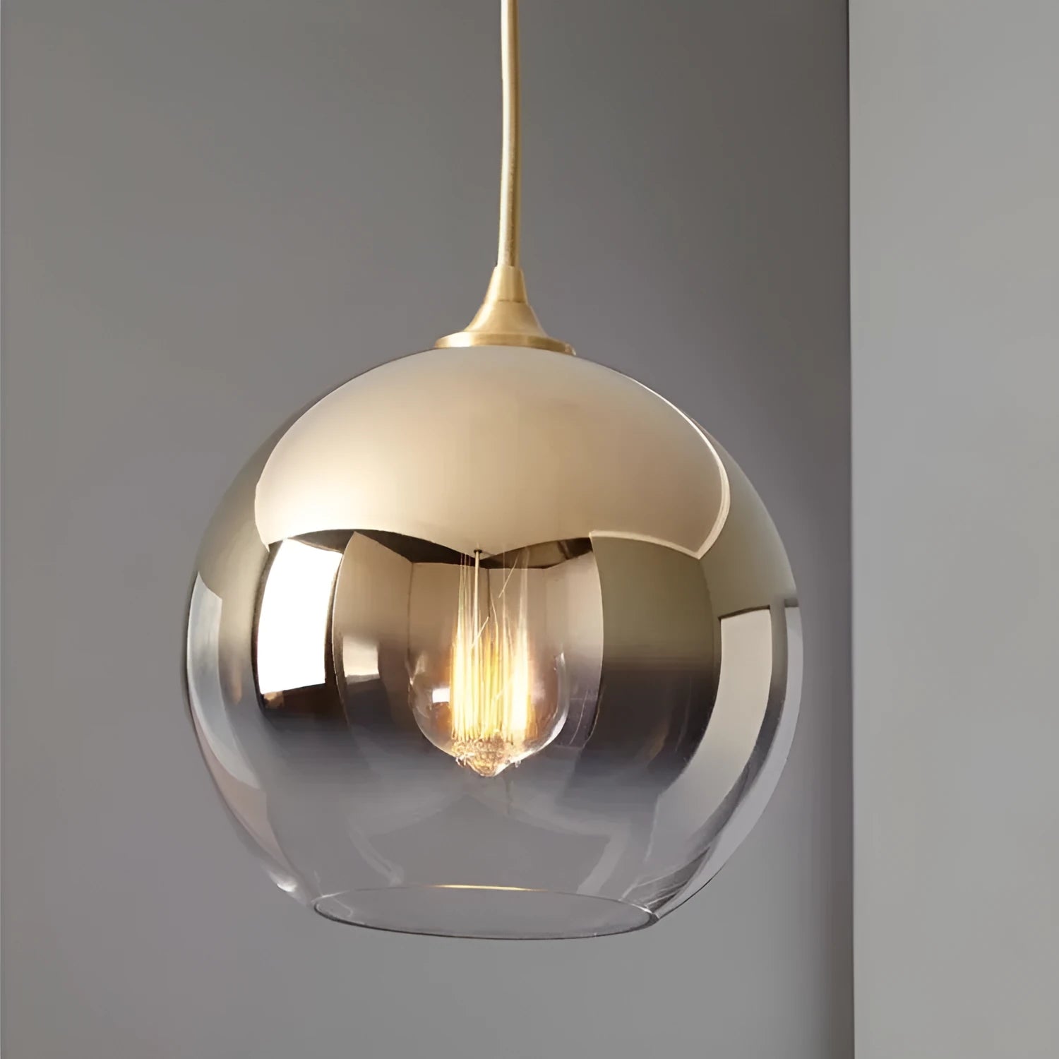 Glass gradient ball chandelier with gold finish, adjustable height, ceiling mounted for bedroom or bar use