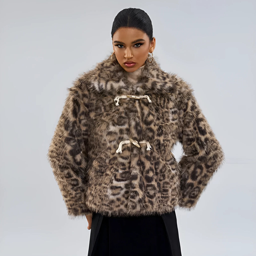 Women's leopard print coat with a buckle lapel front, shown in street fashion style