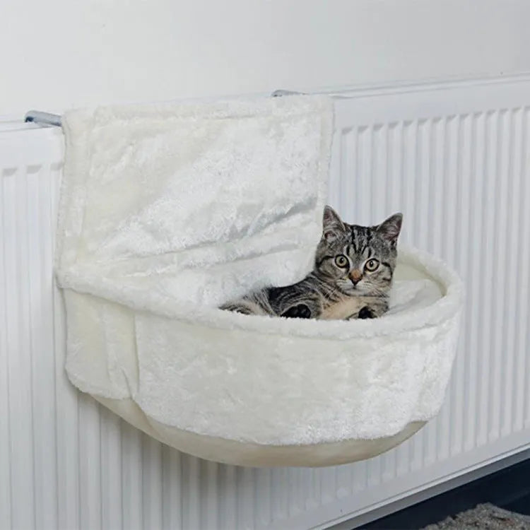 Iron frame cat hammock with grey fleece fabric suspended on a metal frame.