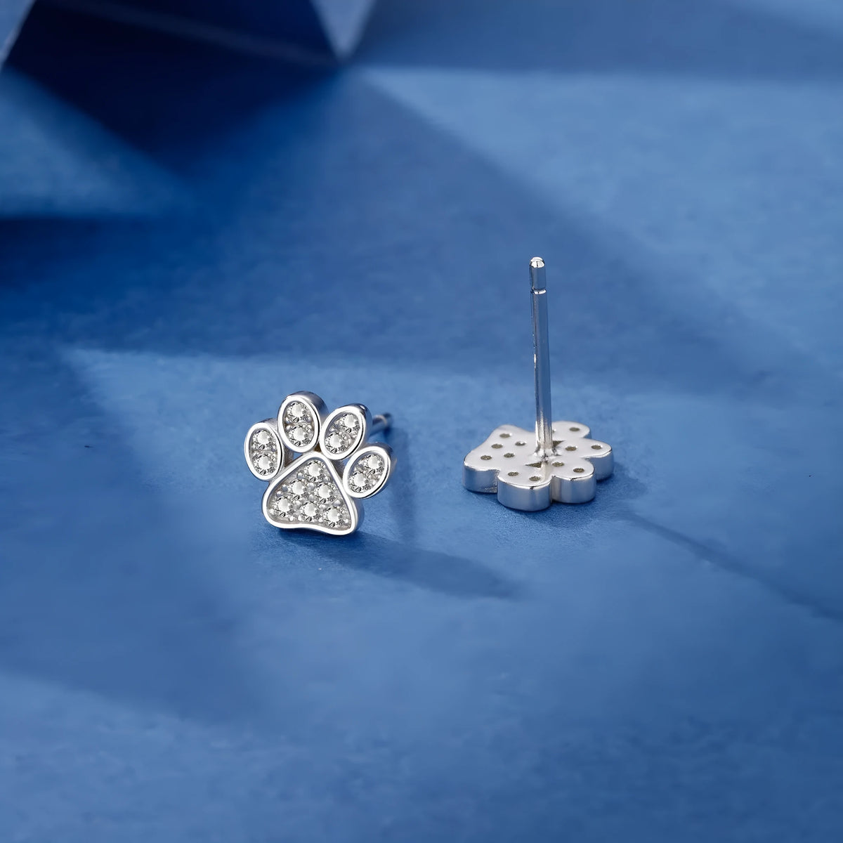 Pair of 925 sterling silver cat's paw stud earrings with full diamond zircon stone setting in silver