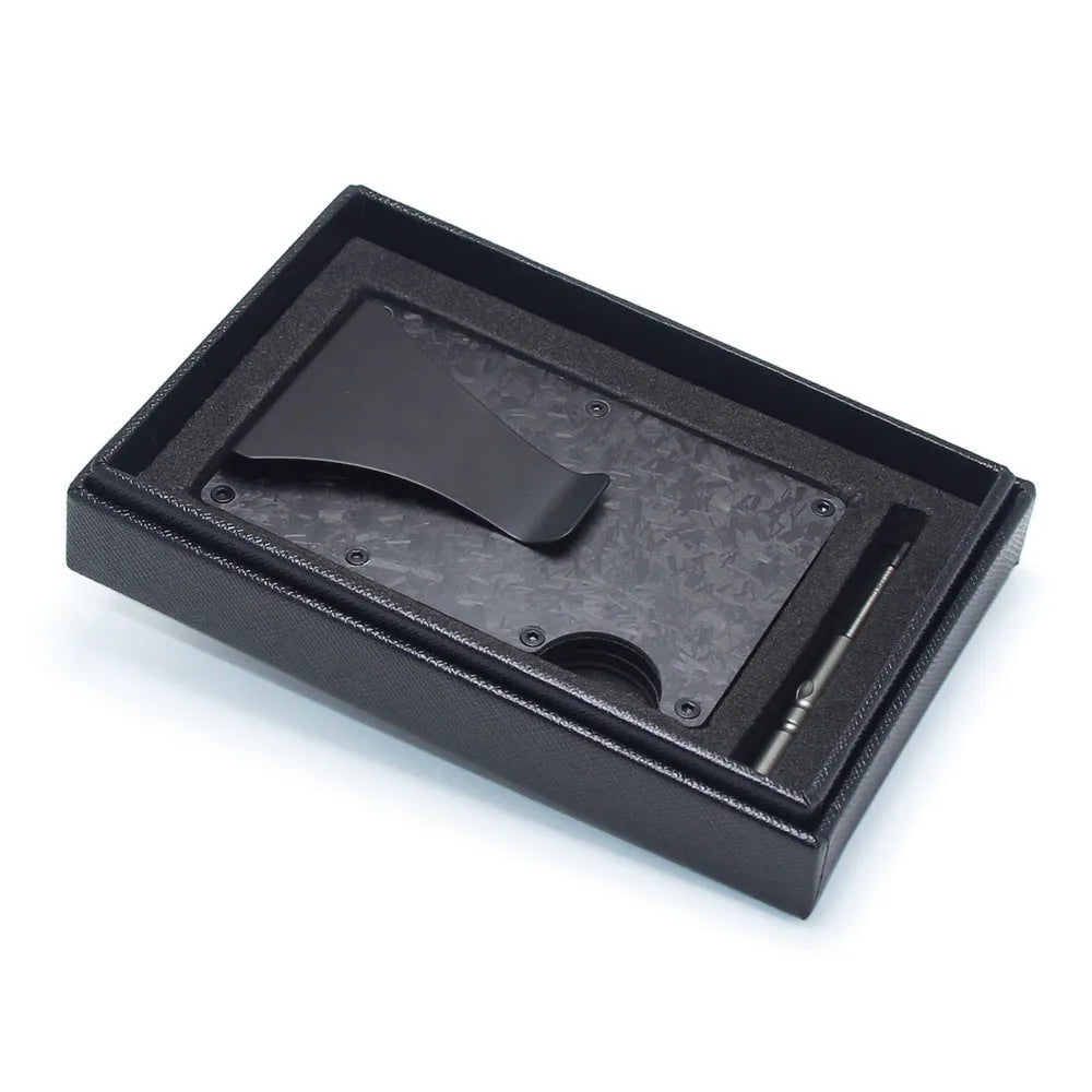 CH6600 geometric card holder in black carbon fibre, showing slim 8mm profile and card slots.