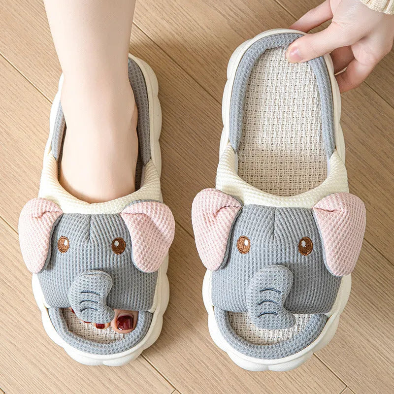 Elephant grey linen open toe slippers for couples with PVC soles on wooden floor