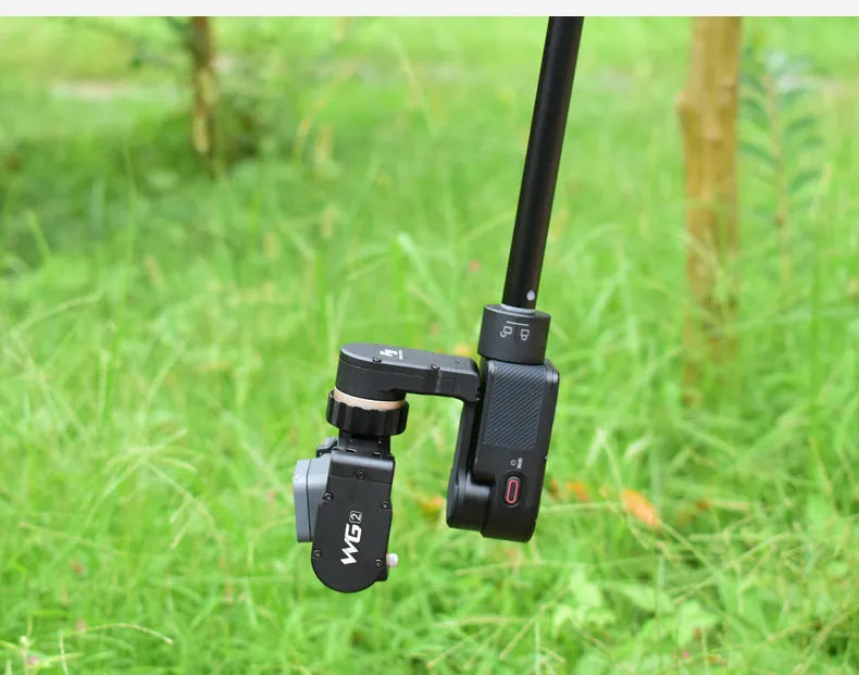 Black retractable aluminium selfie stick with Bluetooth remote and phone mount extended