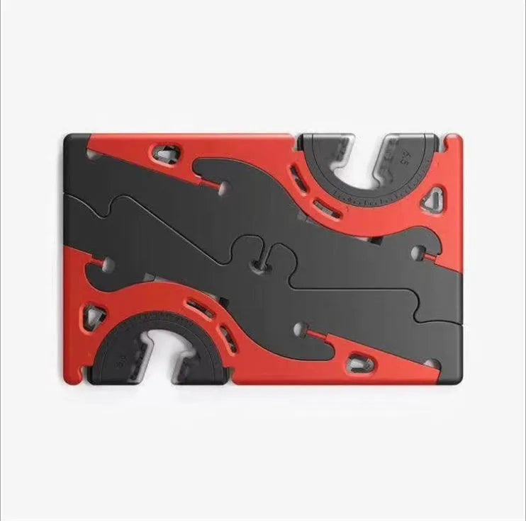 Plastic card type mobile phone holder in various colours on a desktop.