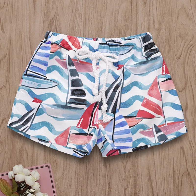 Men's casual beach print pants in blue with drawstring waist, 75% polyester blend