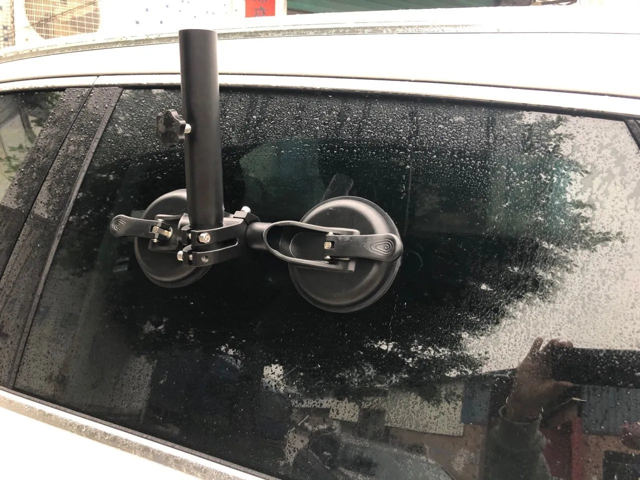 Black ABS car flagpole sucker mount with round glass suction cup for off-road vehicles.