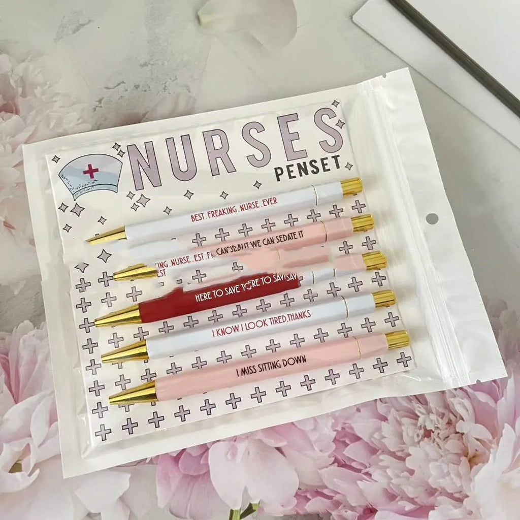 Five nurse-themed ballpoint pens with retractable mechanisms and printed medical copywriting