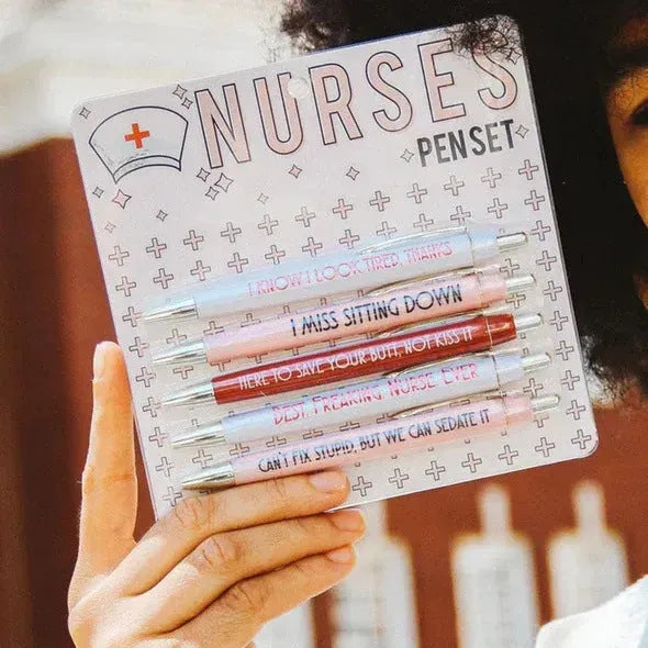 Five nurse-themed ballpoint pens with retractable mechanisms and printed medical copywriting