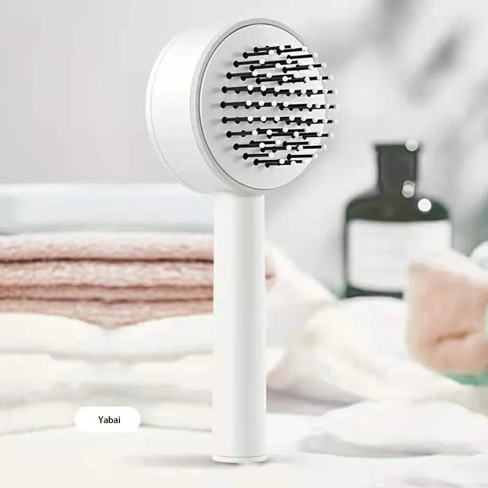 One-key self-cleaning hair brush with 3D air cushion, non-slip handle, and massage tips in green colour