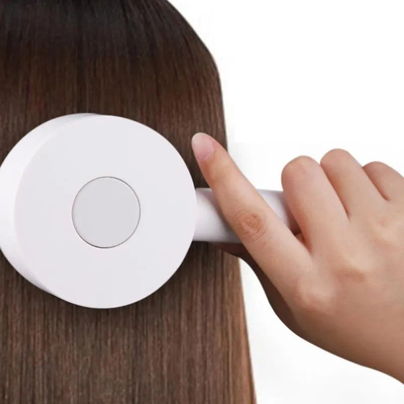 One-key self-cleaning hair brush with 3D air cushion, non-slip handle, and massage tips in green colour