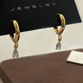 Zircon necklace, earrings, and anklet set for women with geometric meteor shower pendant.
