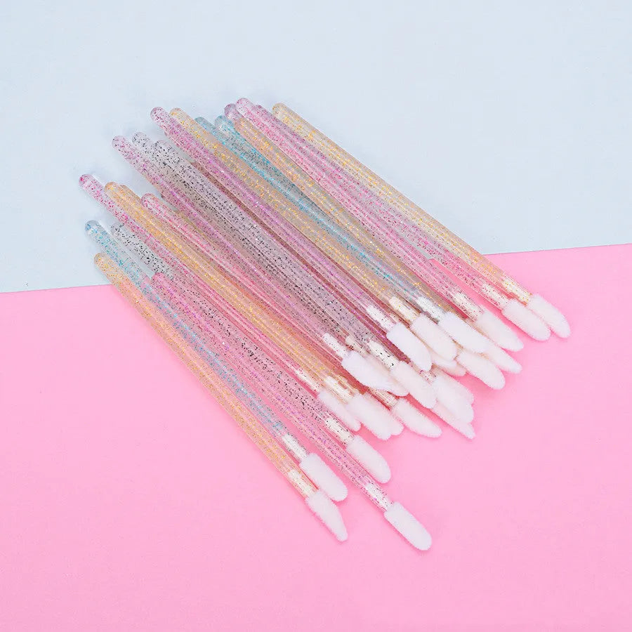 Crystal rod lip brush with man-made fibre bristles, 9cm total length, red colour, on white background