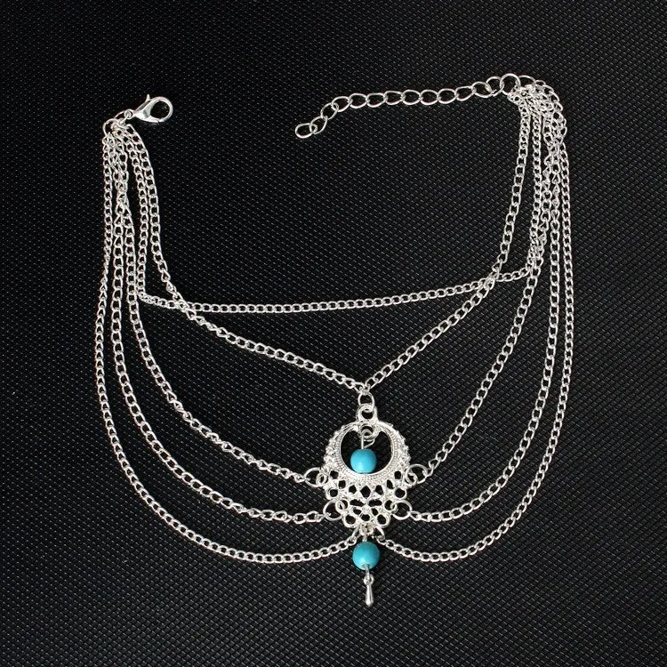 Bohemian chain anklet in Ancient Silver, 21 cm length, 2.3 cm width, on a plain background