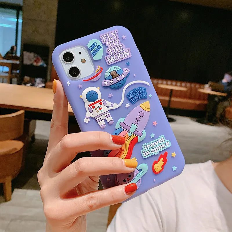 Purple silicone iPhone case with cartoon astronaut design for multiple models