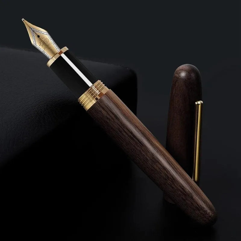 Wooden fountain pen with rotating cap showing grain detail and nib options