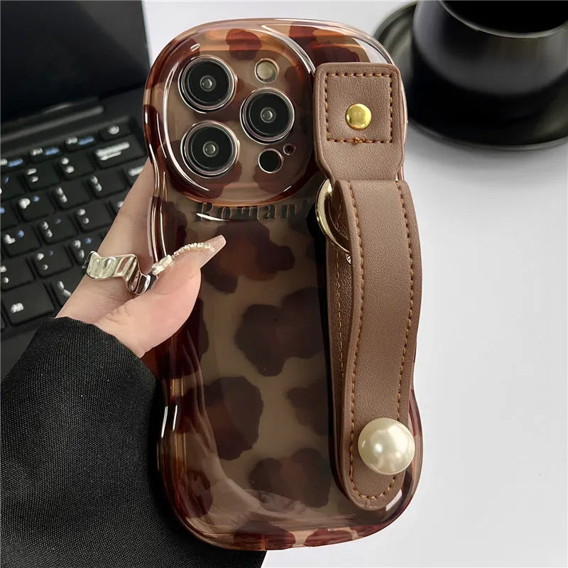 Brown leopard print silicone iPhone case with leather wristband, anti-fall, compatible with iPhone 11 to 15 Pro Max