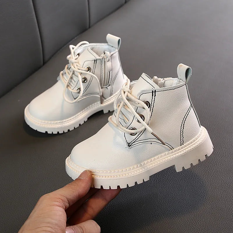 Boys leather short boots with synthetic upper and rubber sole in beige colour, side view