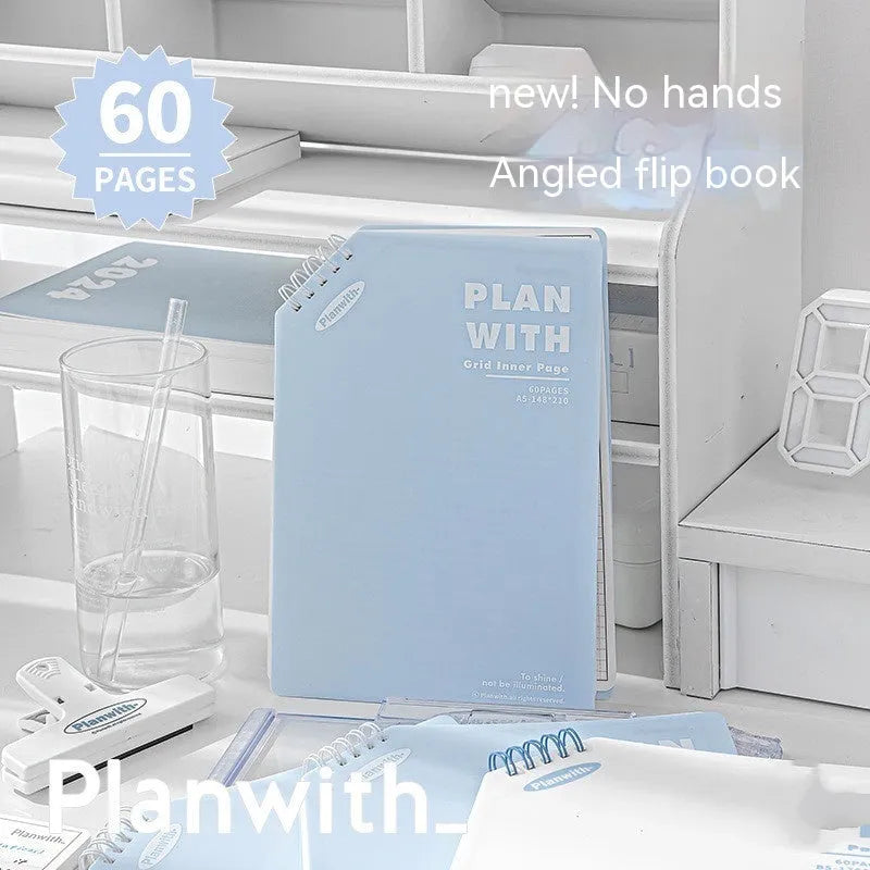 Oblique angle artsy draft notebook showing A5 and B5 sizes with white and blue plaid cover options.