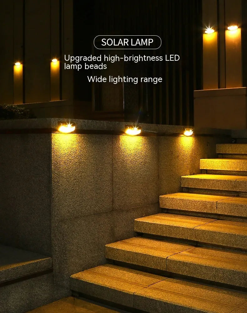 Solar-powered smiling face outdoor wall lamp with warm or white light options.