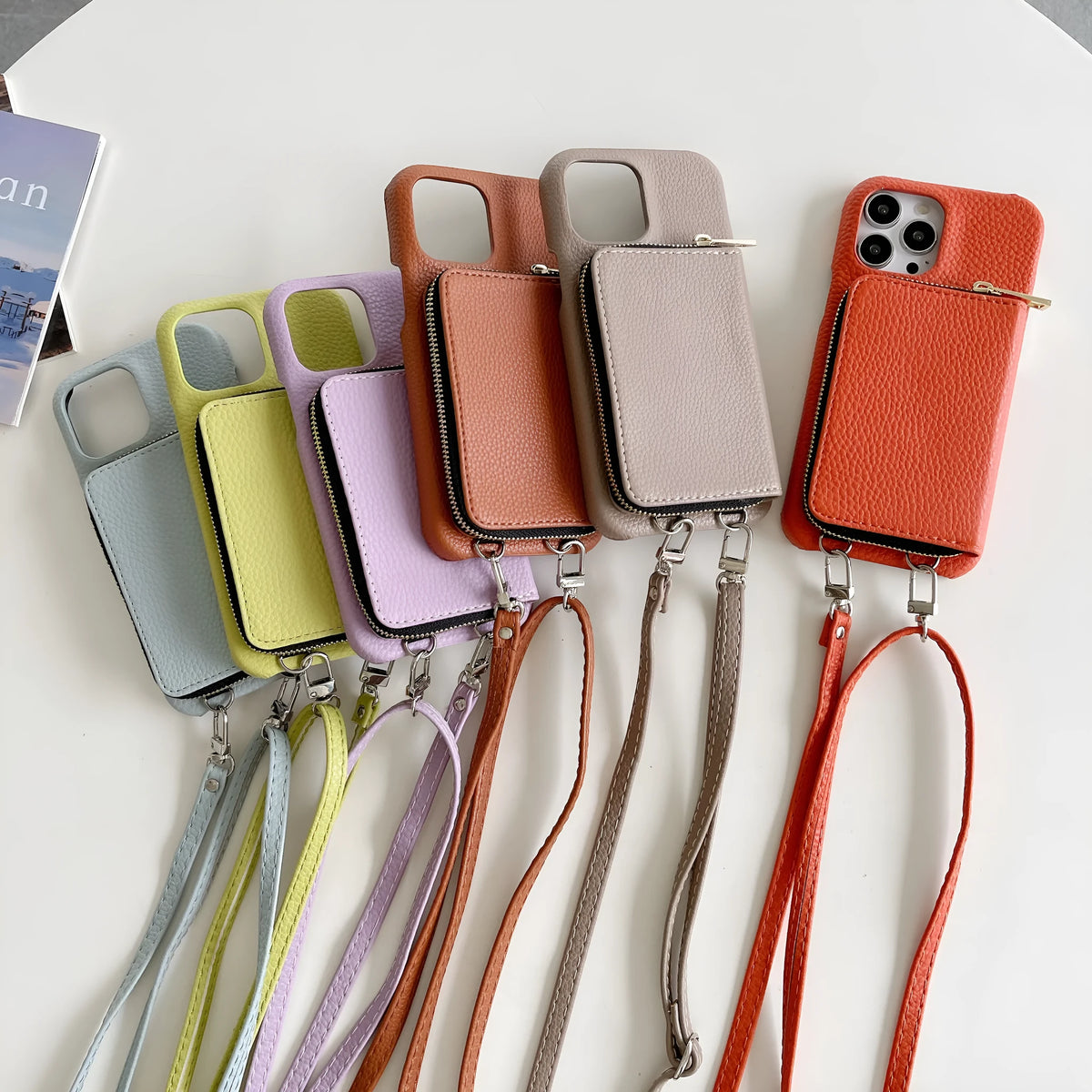 Leather phone case with lychee pattern, zipper card holder, and lanyard in black