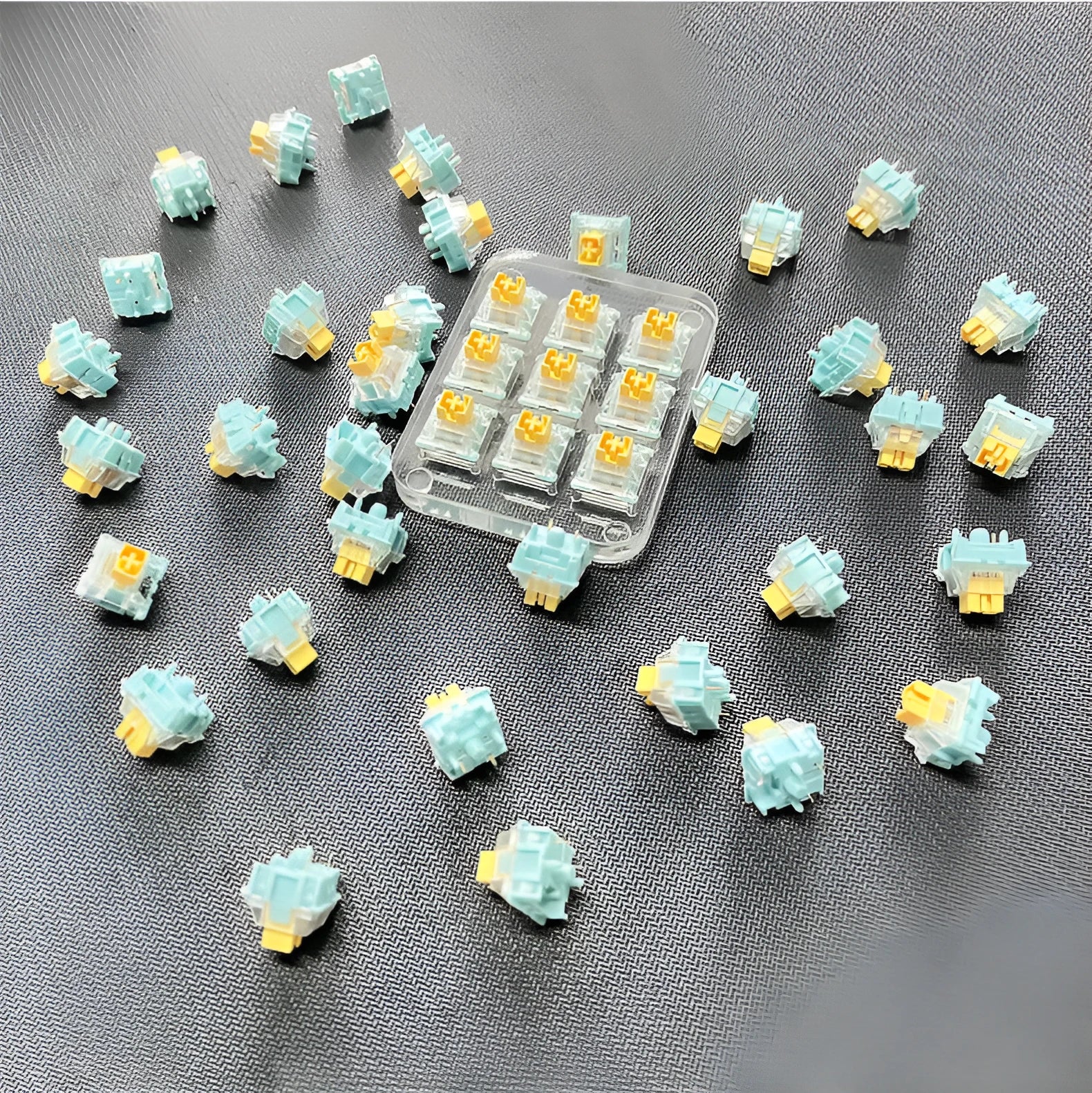 36 Sea Salt Lemon PRO Mute tactile keyboard switches for mechanical keyboards on a white background.