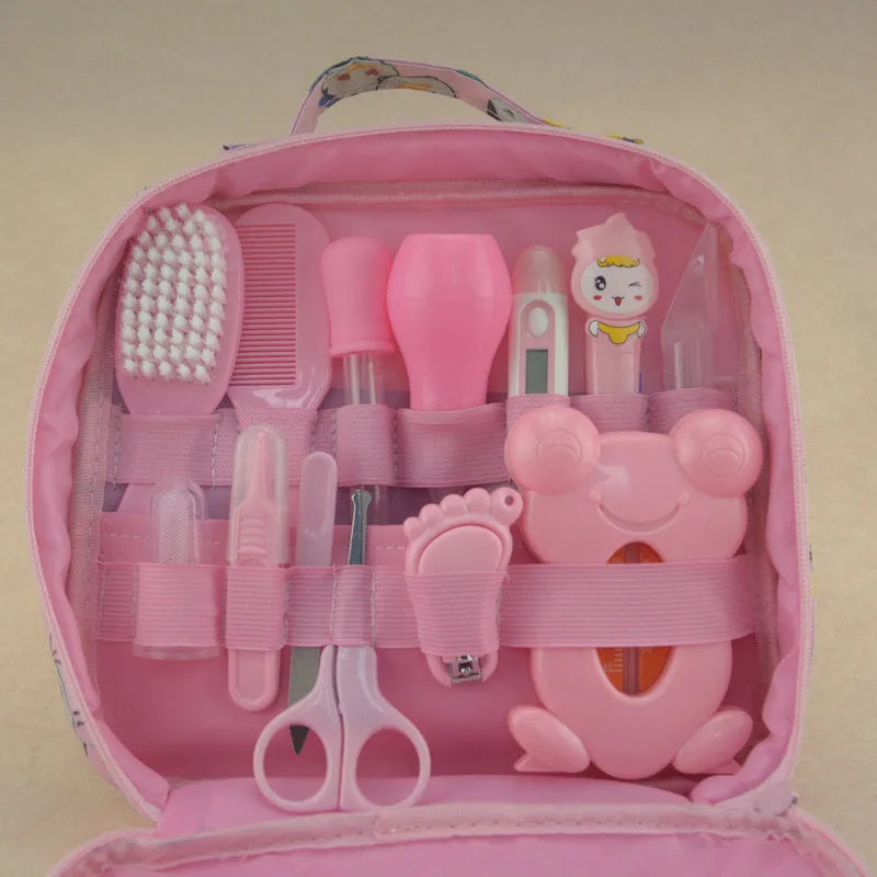 Roadfisher newborn baby care kit with grooming tools and health monitoring devices in blue or pink colour